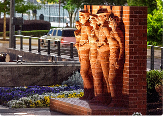 Bronze statue of soldiers at a memorial in Central Alabama.